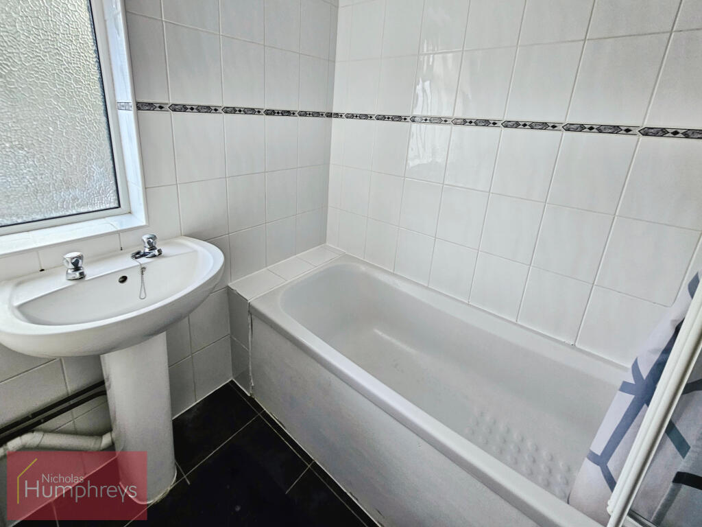 Bathroom with bath and shower in Hatfield shared house